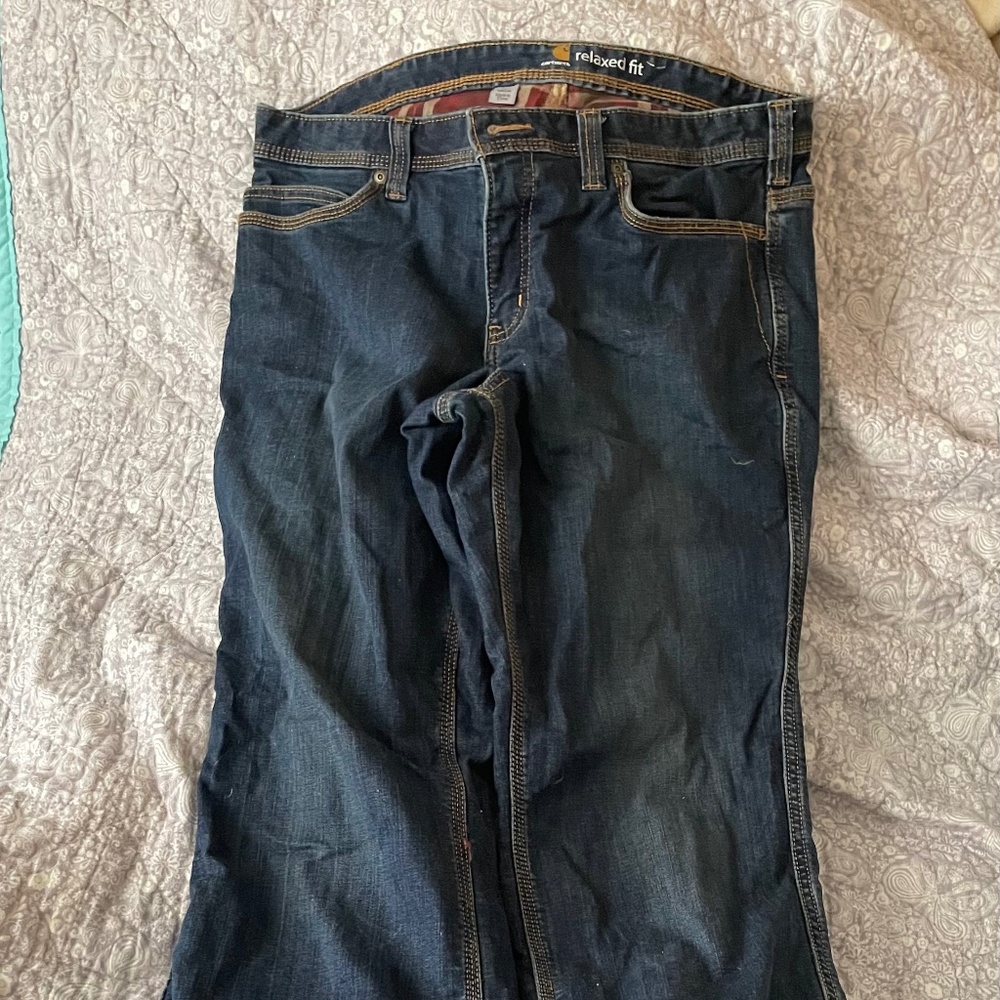 Like new!  Carhartt womens flannel lined jeans, size 14 regular